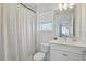 Clean bathroom with modern fixtures, shower and ample lighting at 4779 Cragmere Loop, Clermont, FL 34711