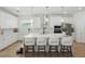 Stunning kitchen with stainless steel appliances, large center island with seating, and ample cabinet space at 4779 Cragmere Loop, Clermont, FL 34711