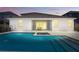 Backyard pool with spa, patio, covered area, and well-maintained landscaping at 4779 Cragmere Loop, Clermont, FL 34711