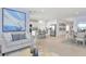 Open-concept living space with contemporary furnishings, a modern kitchen, and plenty of room for entertaining at 4928 Bluebell Ct, Lake Hamilton, FL 33851