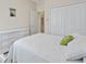 Serene bedroom featuring ample closet space and a dresser, creating a comfortable and organized environment at 5108 Creekside Park Ave, Orlando, FL 32811