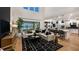 Bright living room with an open floor plan features soaring ceilings and elegant decor at 536 Moon Shell Cir, New Smyrna Beach, FL 32168