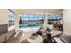 Covered patio with a pool, waterfront views, and stylish outdoor furniture at 536 Moon Shell Cir, New Smyrna Beach, FL 32168