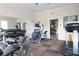 Community gym with modern exercise equipment and a mirrored wall at 5510 Siracusa Ln, Sanford, FL 32771