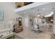 Open-concept living space features high ceilings, lots of light, and clear view of the modern kitchen at 5510 Siracusa Ln, Sanford, FL 32771
