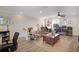 Spacious loft area featuring wood floors, comfortable seating, and desk space at 5510 Siracusa Ln, Sanford, FL 32771