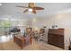 This loft area features a comfortable seating area, a workstation, and bright natural light at 5510 Siracusa Ln, Sanford, FL 32771
