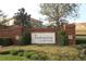 Entrance to the Terracina at Lake Forest community featuring a brick sign and landscaping at 5510 Siracusa Ln, Sanford, FL 32771