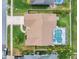 Aerial view of the property showing the backyard pool and the layout of the home at 5836 Goldenwood Dr, Orlando, FL 32817