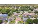 Expansive aerial view of the neighborhood with tree-lined streets and well-maintained homes at 5836 Goldenwood Dr, Orlando, FL 32817
