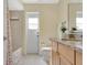 Bathroom with granite countertop and tub/shower combo with backyard access at 5836 Goldenwood Dr, Orlando, FL 32817
