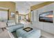 Spacious living room featuring built-in shelving, tile flooring, and comfortable seating at 5836 Goldenwood Dr, Orlando, FL 32817