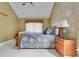 Bright main bedroom boasts a vaulted ceiling, ceiling fan and comfortable layout at 5836 Goldenwood Dr, Orlando, FL 32817