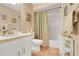 Bathroom with a shower and tub combination and a white vanity at 600 N Boundary Avenue # 119A, Deland, FL 32720