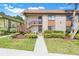 Charming two-story condo with well-maintained landscaping and inviting entrance at 600 N Boundary Avenue # 119A, Deland, FL 32720