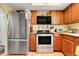 Well-equipped kitchen boasting stainless steel appliances and generous cabinet space at 600 N Boundary Avenue # 119A, Deland, FL 32720