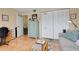 Inviting living room with a comfortable couch, stylish storage, and closet space at 600 N Boundary Avenue # 119A, Deland, FL 32720