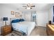 Well-lit main bedroom with lots of closet space, comfortable bed, and hardwood flooring at 617 E Citrus St, Altamonte Springs, FL 32701