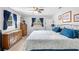 Comfortable bedroom with hardwood floors, bright lighting, and traditional furnishings at 617 E Citrus St, Altamonte Springs, FL 32701
