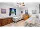 Bedroom featuring two beds, hardwood floors, comfortable rugs, and natural lighting at 617 E Citrus St, Altamonte Springs, FL 32701