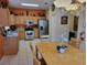 Cozy kitchen with stainless steel appliances and a breakfast nook at 643 Orista Dr, Davenport, FL 33897