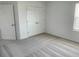 Neutral bedroom featuring carpet and large closet space at 6712 Golden Eagle Blvd, Howey In The Hills, FL 34737