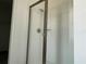 Close-up of a modern shower with glass enclosure and tiled walls at 6712 Golden Eagle Blvd, Howey In The Hills, FL 34737
