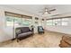 Cozy sun room filled with natural light, perfect for relaxation or entertaining guests at 7237 Edmund Ct, Mount Dora, FL 32757