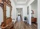 Hallway featuring wood-look flooring and decoratively appointed furnishings at 7748 Four Seasons Blvd, Kissimmee, FL 34747