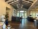 Inviting lounge area with elegant furnishings, a bar, and natural light streaming through large windows at 7748 Four Seasons Blvd, Kissimmee, FL 34747