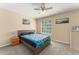 Serene bedroom with a neutral color palette, ceiling fan, and carpet for a peaceful retreat at 7867 Horse Ferry Rd, Orlando, FL 32835