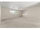 Spacious bonus room featuring neutral paint, carpet, and a ceiling fan for added comfort at 7867 Horse Ferry Rd, Orlando, FL 32835