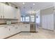 Well-appointed kitchen with stainless steel appliances and granite countertops at 8037 Bangle Ln, Orlando, FL 32836