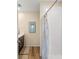 This bathroom includes a shower and sleek vanity at 976 Commons Way, Port Orange, FL 32129
