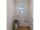 The laundry room has plenty of space at 976 Commons Way, Port Orange, FL 32129
