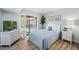 Comfortable bedroom featuring a serene color palette, modern furnishings, and ample natural light at 1000 Winderley Pl # 140, Maitland, FL 32751