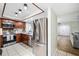 Modern kitchen with stainless steel appliances and tile flooring at 1000 Winderley Pl # 140, Maitland, FL 32751