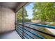 Relaxing screened-in porch overlooking a picturesque water feature and beautiful landscaping at 1000 Winderley Pl # 140, Maitland, FL 32751