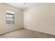 Small bedroom with carpet and a window at 141 Campanello Ct, Daytona Beach, FL 32117