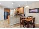 Eat-in kitchen area featuring wooden cabinets and tile flooring at 141 Campanello Ct, Daytona Beach, FL 32117