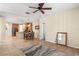 Open-concept living room leading into the kitchen, with tile floors and lots of space at 141 Campanello Ct, Daytona Beach, FL 32117