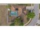 Aerial view of home featuring screened in pool, spacious backyard and well manicured landscaping at 5091 Plymouth Turtle Cir, St Cloud, FL 34772