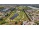 Aerial view of the golf course and neighborhood at 5091 Plymouth Turtle Cir, St Cloud, FL 34772