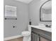 Bathroom with vanity, a toilet, and tiled flooring at 5091 Plymouth Turtle Cir, St Cloud, FL 34772