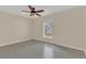 Bedroom featuring wood-look flooring and a ceiling fan at 5091 Plymouth Turtle Cir, St Cloud, FL 34772
