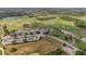 Scenic aerial view of a beautiful golf course and surrounding landscape at 5091 Plymouth Turtle Cir, St Cloud, FL 34772