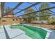 Screened-in pool offers a relaxing outdoor experience with a beautiful backyard view at 5091 Plymouth Turtle Cir, St Cloud, FL 34772