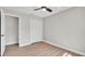 The bedroom features a spacious closet and neutral tones creating a serene and inviting atmosphere at 1458 Heather Way, Kissimmee, FL 34744