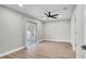 A light and airy bedroom boasts a sliding glass door for easy access to outdoor spaces at 1458 Heather Way, Kissimmee, FL 34744