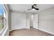 The bedroom features a spacious closet and neutral tones creating a serene and inviting atmosphere at 1458 Heather Way, Kissimmee, FL 34744
